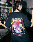 camiseta negra con estampado serigráfico de corazón cocinando tacos mexicanos