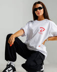 camiseta blanca holgada salva al mundo